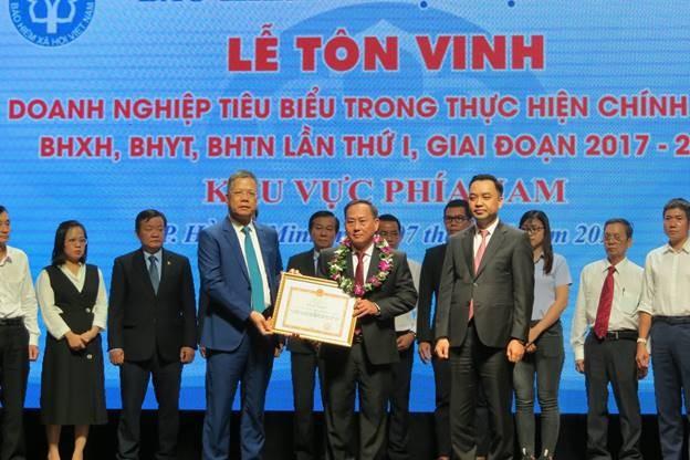 Công ty cà phê 719 được tôn vinh là doanh nghiệp tiêu biểu trong thực hiện chính sách Bảo hiểm xã hội, Bảo hiểm y tế