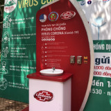 Installing a makeshift hand washing station at Buon Ma Thuot Coffee-Book Street